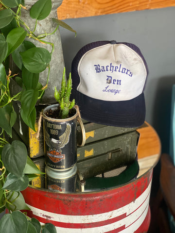 Bachelor's Den Lounge Trucker Hat